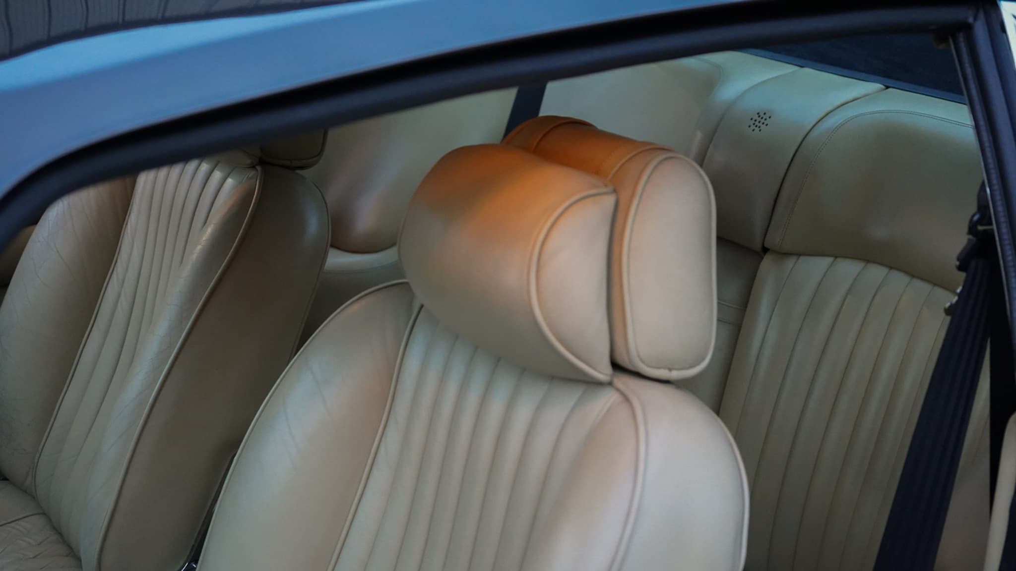 1985 Aston Martin V8 Saloon Series 4 “Oscar India” interior showing the front seat headrest.