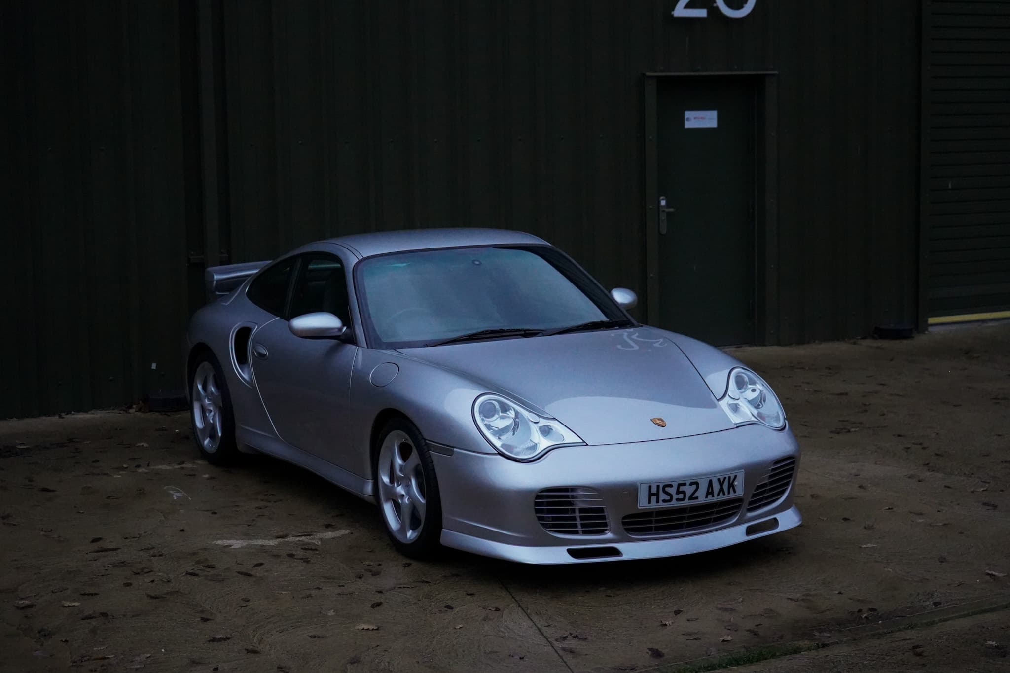 Silver Porsche 911 (996) Turbo X50 Pack in a front three-quarter view.