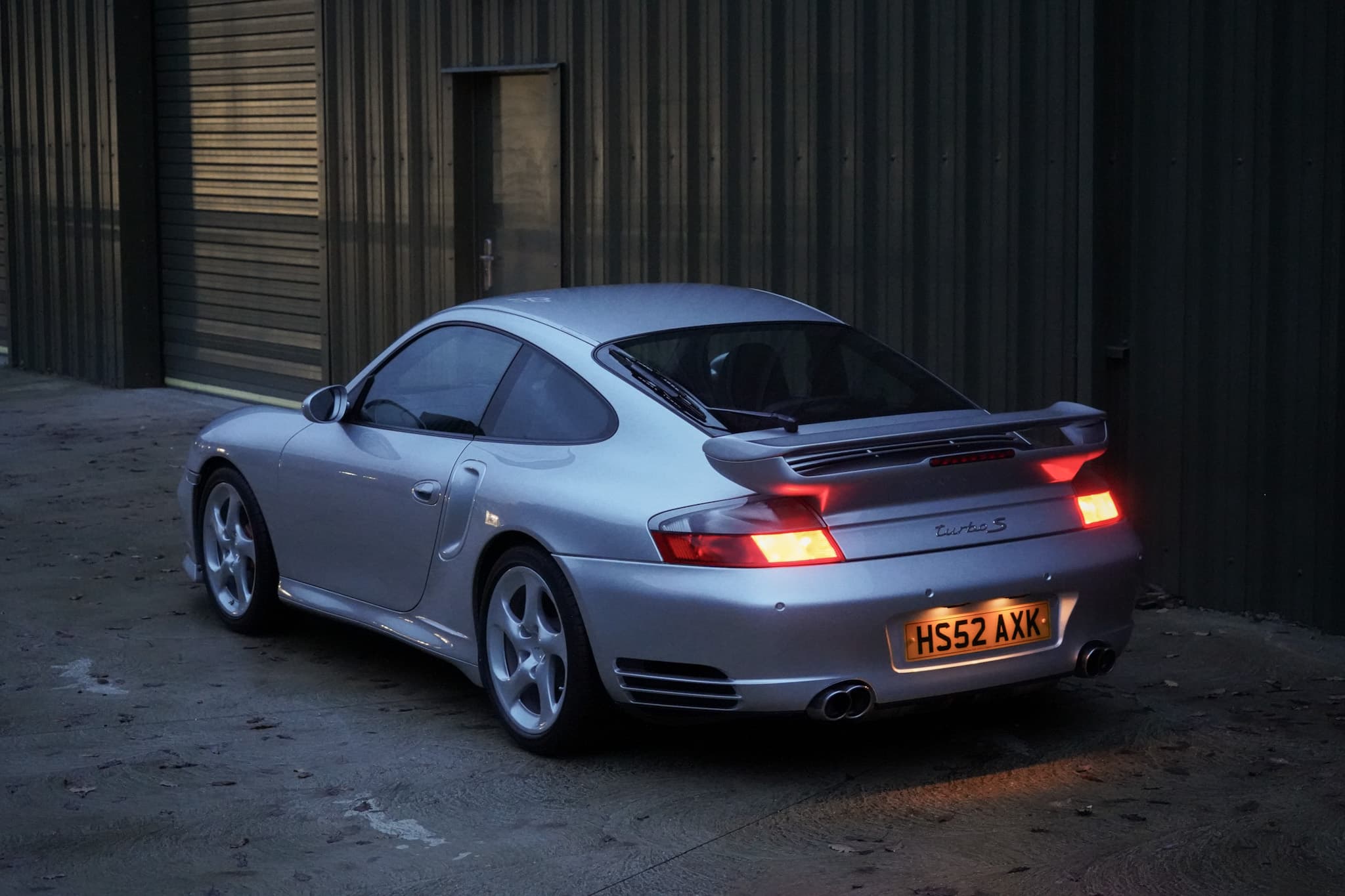 Silver Porsche 911 (996) Turbo X50 Pack in a rear three-quarter view.