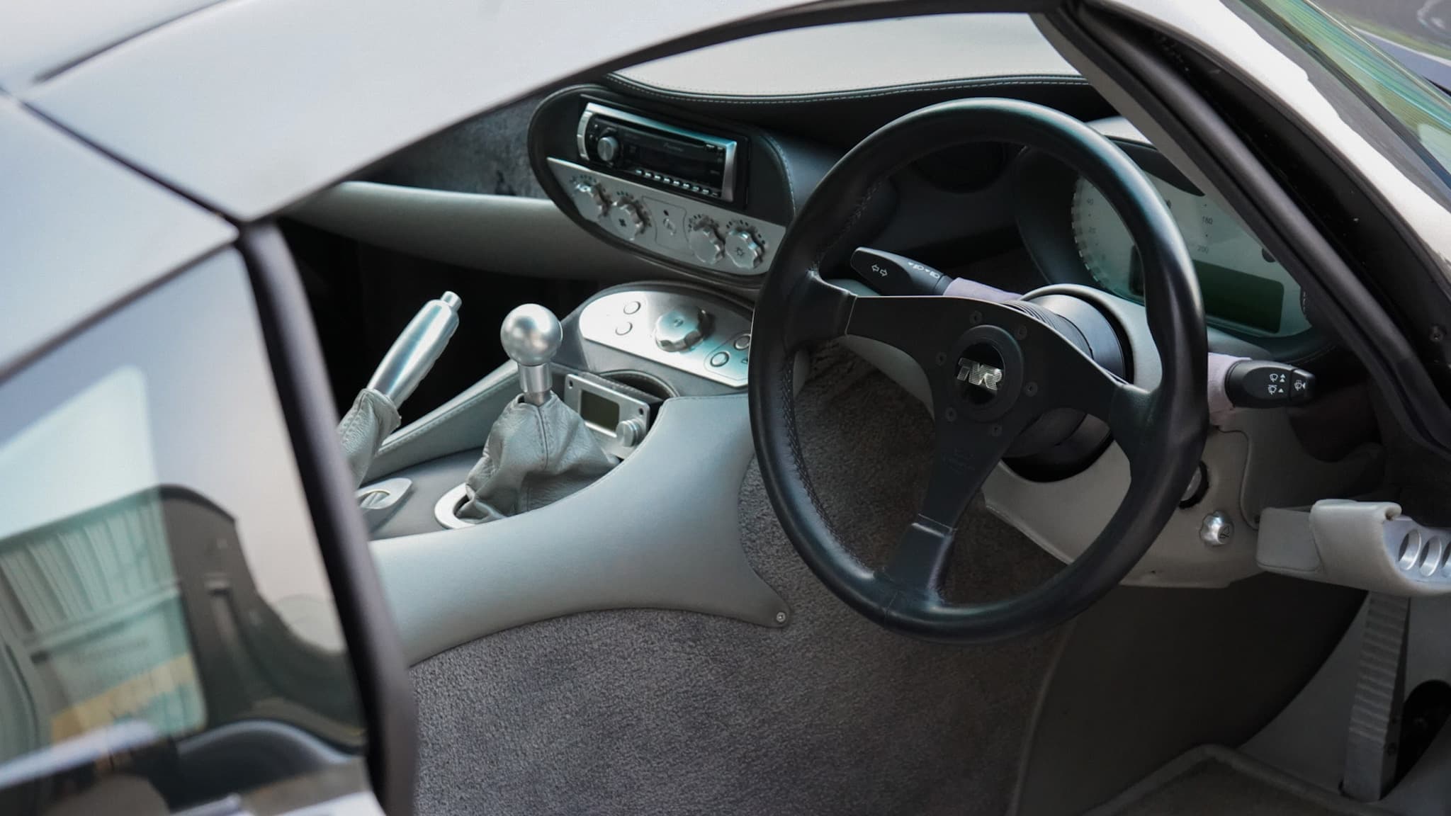 2008 TVR Tuscan 2 Mk3 interior showing the steering wheel dashboard and centre console.