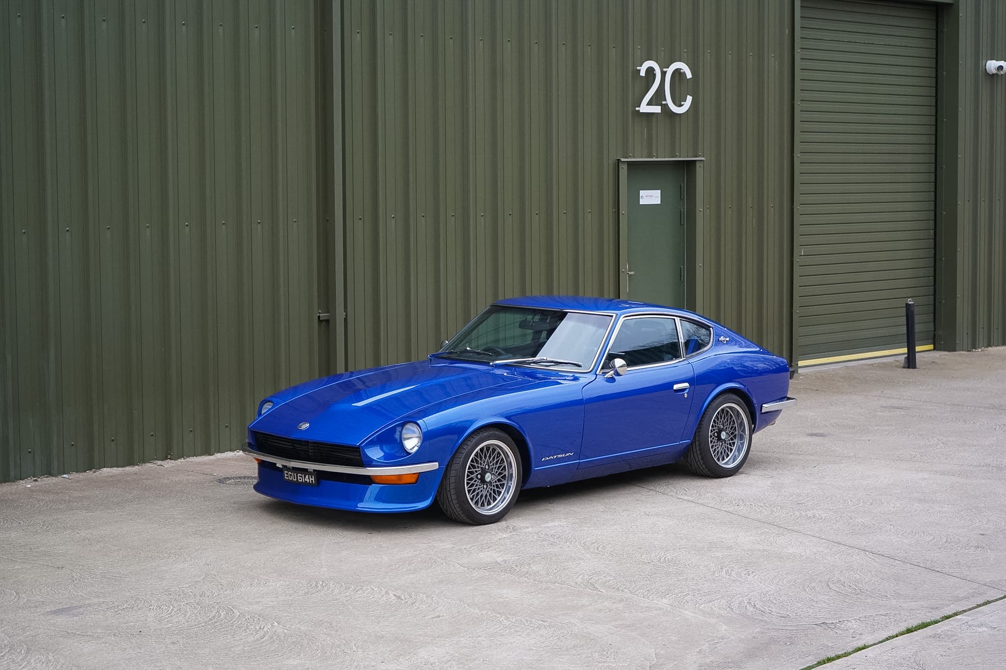 Blue Datsun 240Z Restomod front three-quarter view.