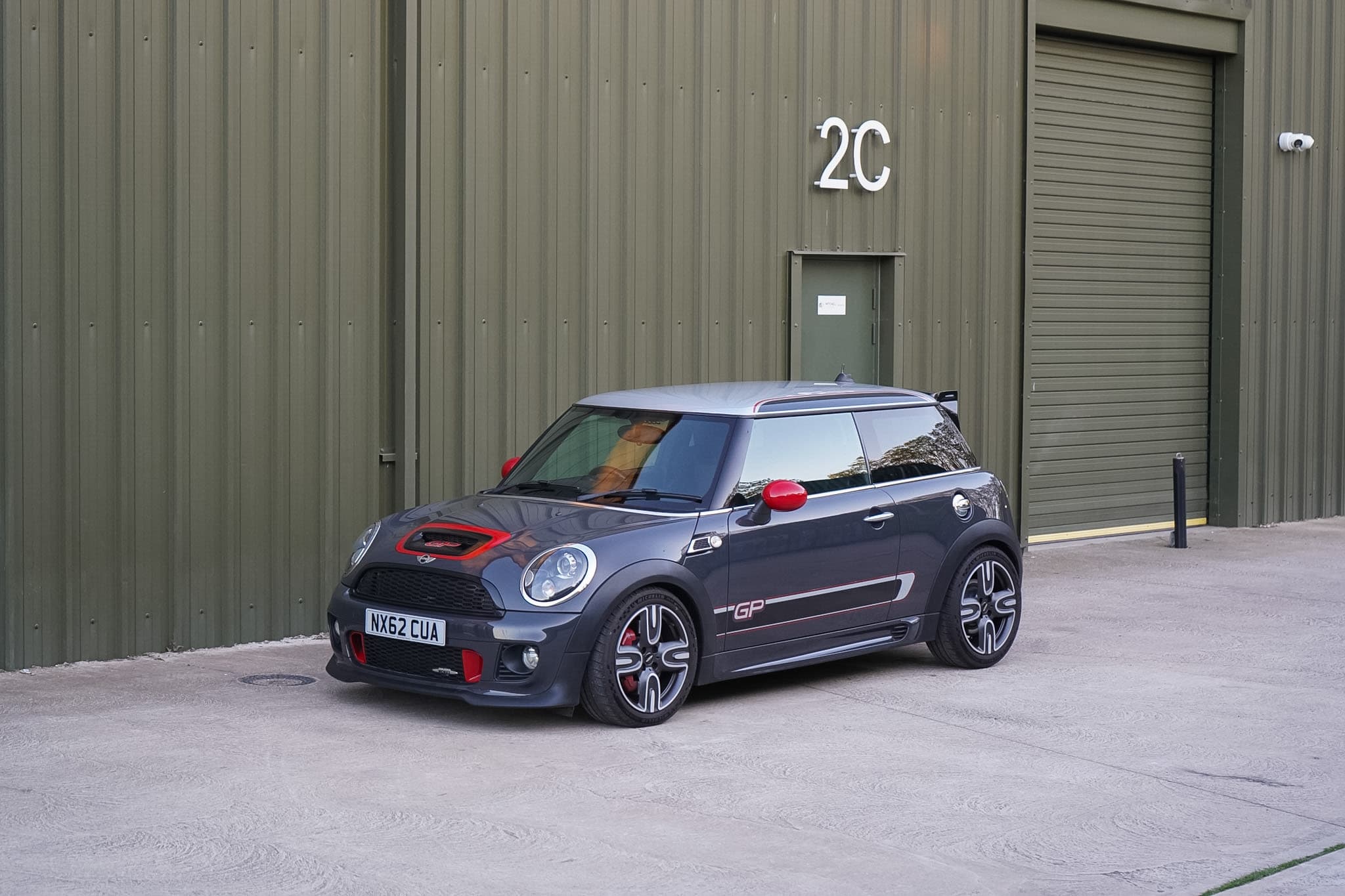 Dark grey MINI GP2 (R56) front three-quarter view.