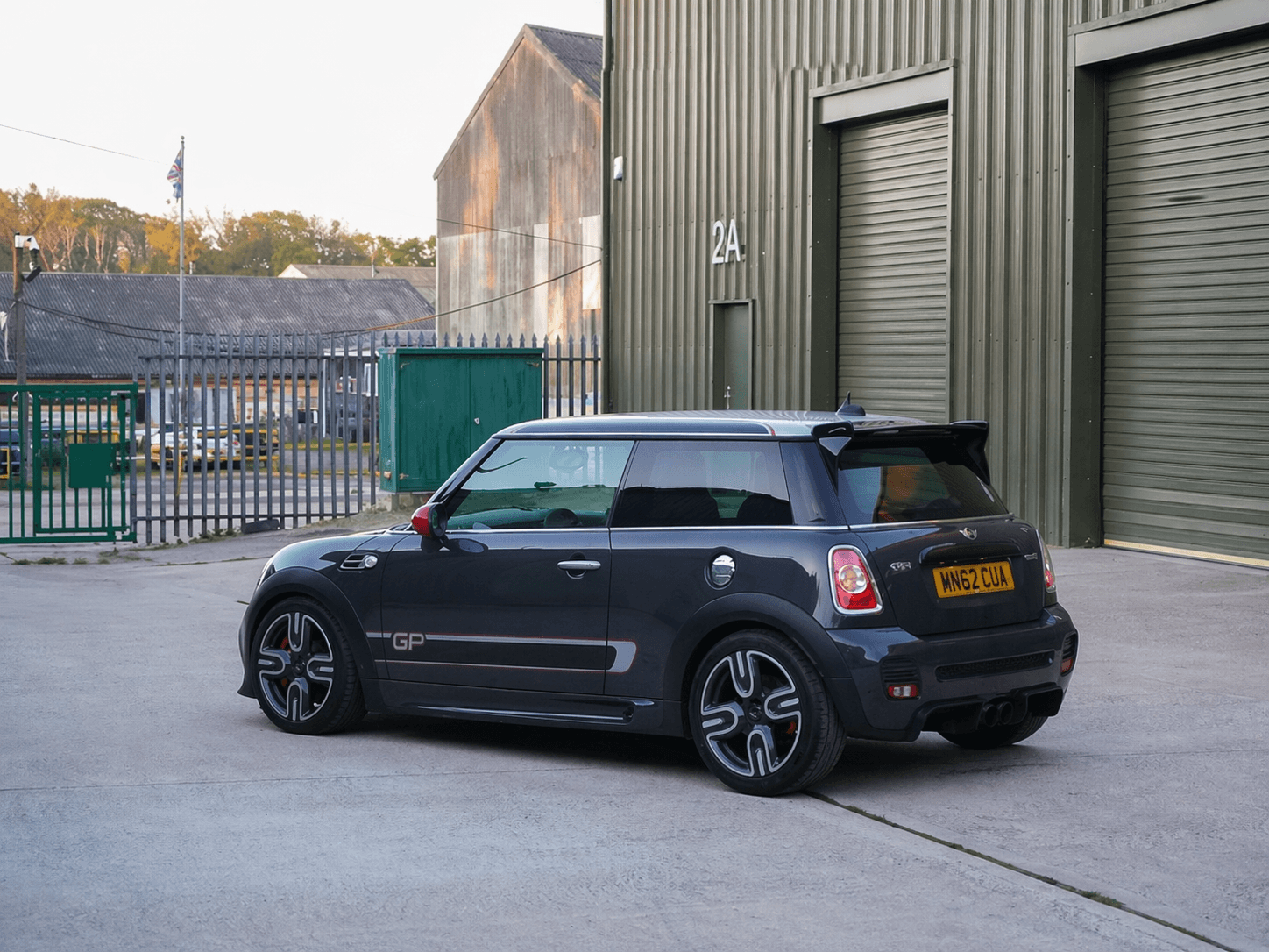 Dark grey MINI GP2 (R56) wide rear three-quarter view.