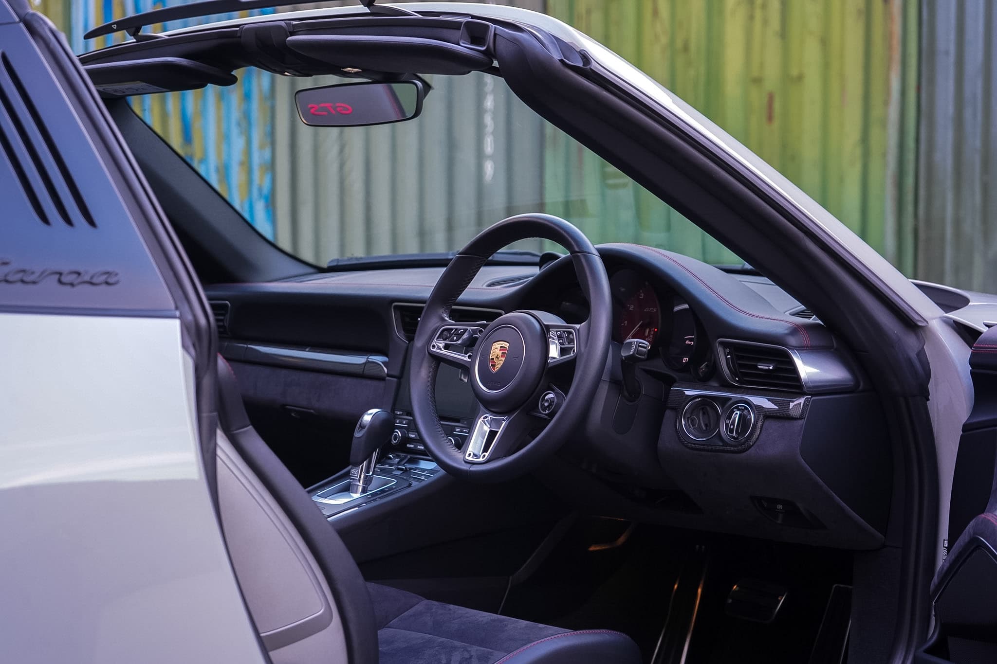2018 Porsche 911 (991.2) Targa 4 GTS driver cockpit with the door open.